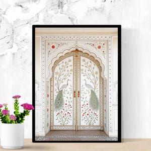 May include: Framed art print featuring a detailed illustration of a white arched doorway with gold trim. The doors are adorned with peacocks, floral patterns, and red flowers. The artwork is set against a white marble background.