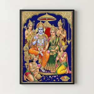 May include: A framed, colourful illustration of Hindu deities. The central figures are seated, adorned with gold jewellery and crowns, against a deep blue backdrop. Surrounding figures are in traditional attire, with intricate details and vibrant colours. The artwork is framed in black.