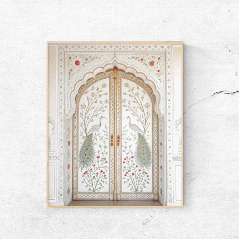 May include: A framed print featuring a detailed illustration of a white door with an arched doorway. The door is adorned with floral and peacock designs in red, green, and gold. The artwork has a vintage, ornate style.
