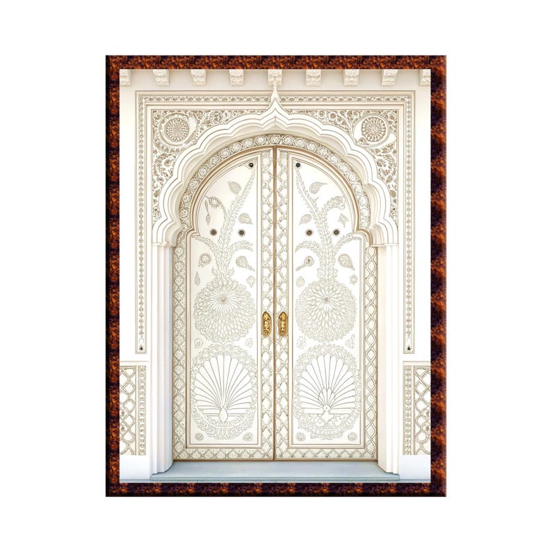 May include: A detailed image of a white, ornate door with intricate carvings and floral designs. The door features a decorative archway and is framed by a dark brown border. The door has gold-colored handles.