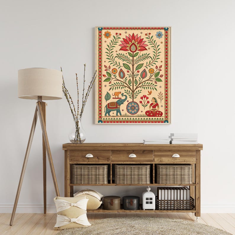 May include: A framed, colorful Indian folk art print. The artwork features a central tree with a large red flower, surrounded by leaves, flowers, and animals. The border is red with a repeating pattern. The background is beige.