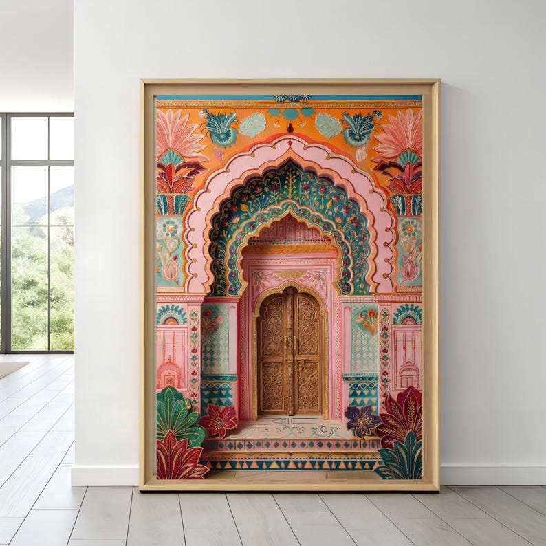 May include: A framed art print depicting a detailed illustration of an archway and wooden doors. The artwork uses a vibrant colour scheme of pink, orange, green, and gold, with complex floral and geometric patterns. The print is set against a white wall.