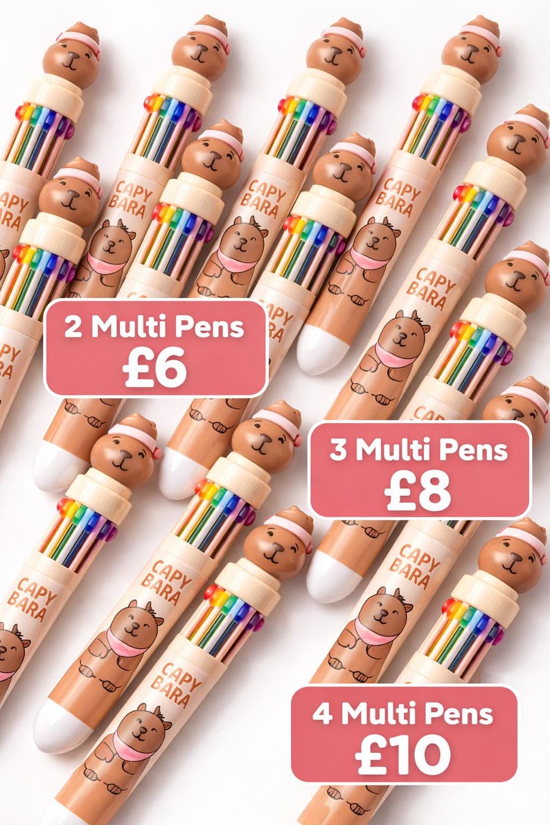 May include: Multiple multi-color pens with bear-shaped toppers. Each pen has a rainbow of colors and the text "CAPY BARA". The image includes text indicating the number of pens available.
