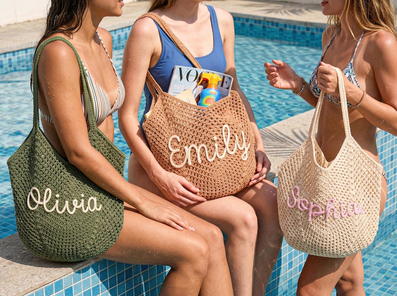 May include: Three crochet tote bags in olive green, tan, and cream, each with a name embroidered on the front: Olivia, Emily, and Sophia. The bags are open-topped and appear to be beach or pool-themed.