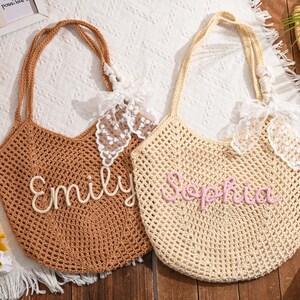 May include: Two crochet tote bags, one brown and one beige, with long handles and decorative lace bows. The brown bag has the name "Emily" stitched on it, and the beige bag has the name "Sophia" stitched on it.