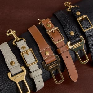 Luxury Leather Dog Seatbelt Tether – Gold Hardware – Black, White, Tan & Pink Options – Gift for Dog Owners – Travel Accessory