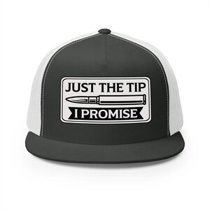 May include: A black and white trucker hat with a mesh back. The front panel features a white rectangle with the text "JUST THE TIP I PROMISE" and a graphic of a bullet.