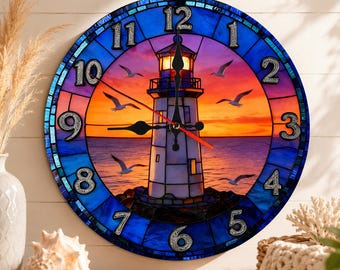 May include: A round wall clock featuring a stained glass style design of a lighthouse at sunset. The clock face displays a vibrant orange and purple sky over a dark blue ocean with flying seagulls. It has black hands and large silver numbers.