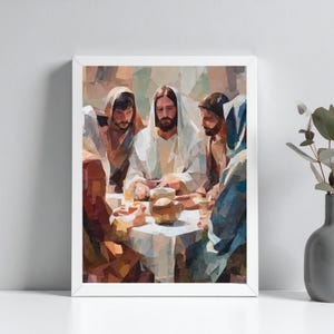 May include: A framed print depicting a religious scene with several figures gathered around a table. The artwork features a muted color palette with shades of brown, white, and blue. The figures are dressed in robes, and the scene appears to be a meal.