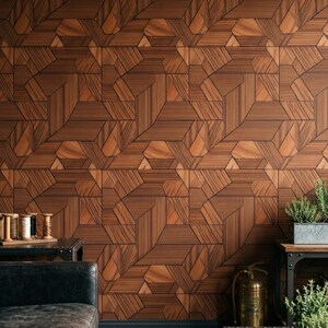 May include: Wallpaper featuring a repeating geometric pattern of brown wood-toned panels with thin black lines. The design consists of interlocking shapes that create a textured, layered appearance across the entire surface of the wall.