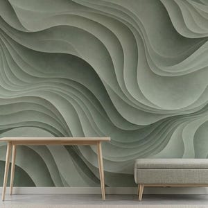 May include: A wall mural featuring a series of overlapping, flowing sage green waves that create a sense of depth and movement. The design consists of smooth, layered curves in varying shades of muted green, covering the entire wall surface.