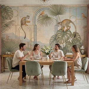 May include: A dining room scene with a wooden table set for a meal. Four people are seated around the table. The room features a mural with monkeys, birds, and tropical foliage. Green chairs with gold legs are around the table.
