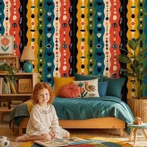 May include: Wallpaper featuring a repeating vertical pattern of wavy stripes in mustard yellow, forest green, deep blue, and burnt orange. The design includes stylized botanical motifs, circular shapes, and abstract eye-like icons on a black background.