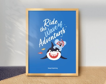 May include: A framed art print with a blue background features a cartoon shark with a smiling face and a koala wearing a snorkel. The text "Ride the Wave of Adventures" is written in white script. The phrase "Keep Exploring" is at the bottom.
