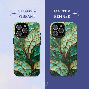May include: Two phone cases with a leaf design. The left case has a glossy finish, and the right case has a matte finish. The leaf design features shades of green and gold, with the text "Glossy & Vibrant" and "Matte & Refined".