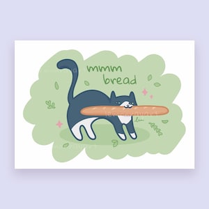 May include: A whimsical illustration of a navy blue and white cat carrying a baguette in its mouth. The cat is set against a light green background with the words "mmm bread" above it. Decorative leaves and pink stars surround the cat.