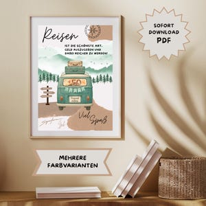 May include: A framed travel-themed print featuring a teal van with luggage, set against a mountain backdrop. The print includes the German word "Reisen" and the phrases "Travel vibes" and "Viel Spa&szlig;". The print is in a light-colored frame.