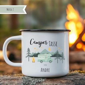May include: White enamel camping mug with a black rim and handle. The mug features a green camper illustration with a mountain and forest scene, the words "Camper Tasse" and "Von Andre".