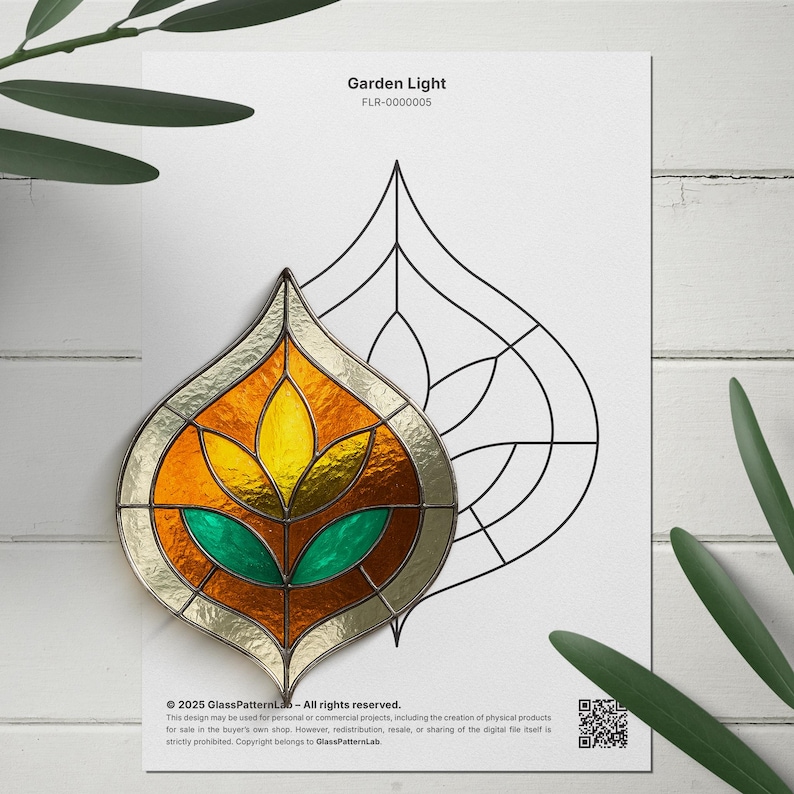 May include: A stained glass design in the shape of a stylized leaf, featuring amber, yellow, and green glass. The design is on a white sheet of paper with the text "Garden Light" and "FLR-0000005". The design is for personal or commercial projects.