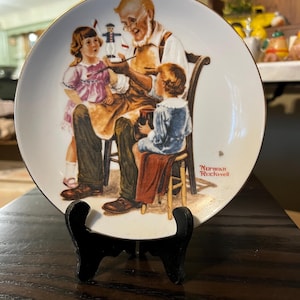 Norman Rockwell collector plates, set of 4