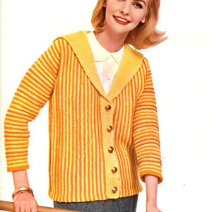 May include: A yellow and orange striped cardigan with a wide collar and button closure. The cardigan is made of a soft, knit fabric.