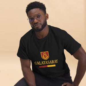 ガラタサライ ファン シャツ チンボン アスラン 1905 |ライオンスピリットユニセックスTシャツ