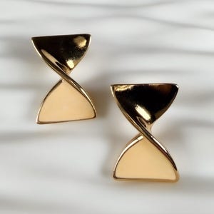 Vintage Avon Bow Twist Earrings Gold Tone Cream Enamel