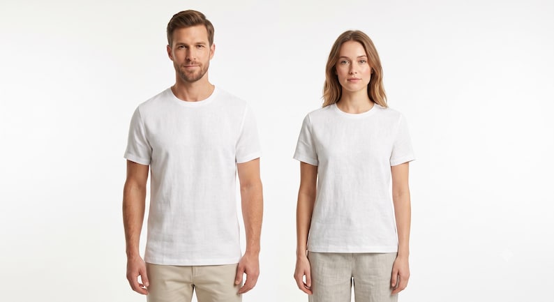 May include: Two plain white short-sleeved t-shirts with a crew neckline. The shirts are made of a solid white fabric and feature a standard fit with straight hems, providing a clean and simple appearance for everyday clothing options.