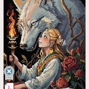 May include: A cross stitch pattern featuring a large grey wolf standing behind a person with blonde hair who holds a lit torch. The scene includes red roses, thorny branches, and a black background. The design includes a PDF icon and a tested badge.