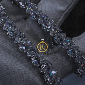 Luxury Moissanite Tennis Bracelet: Pear Cut Sterling Silver Bling