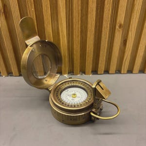 Brass military compass from World War II, pocket compass, and British nautical antique finish compass