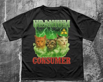 Uranium Consumer Cat Shirt – Funny Radioactive Cats Meme Tee, Green Glow Kitty Graphic T-Shirt, Weird Humor Gift for Cat Lovers