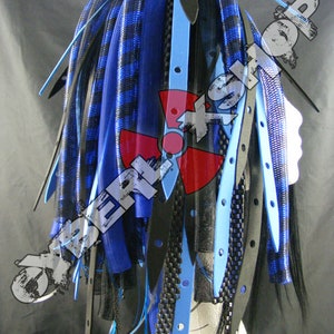 May include: Blue and black synthetic dreadlocks with black and blue straps. The dreadlocks are tied together with black and blue straps.