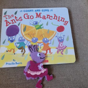 Ants go marching book with five finger puppets.