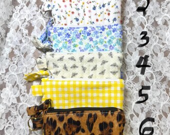 The Sophia Quilted Zipper Pouch/Clutch, Mini Wallet, Airpod Case and other small  essentials.