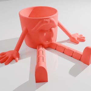 Puede incluir: Una maceta de color coral con brazos, manos y piernas segmentadas. La maceta tiene una abertura redonda y un diseño en forma de cara. Los brazos y las piernas están extendidos, lo que le da a la maceta una apariencia antropomórfica caprichosa.