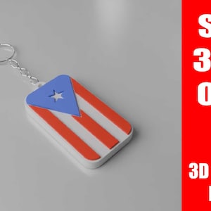 以下が含まれることがあります： プエルトリコ国旗のデザインが施された長方形のキーホルダー。キーホルダーには、白い星が付いた青い三角形、赤いストライプ、シルバーのチェーンとリングが付いています。画像には「STL 3MF OBJ」と「3D PRINT FILE」というテキストも含まれています。