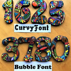 three large numbers made of colorful mosaic tiles, with the numbers 1625 and 375 displayed prominently.