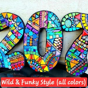 a creative and vibrant mosaic design made up of colorful tiles, forming the numbers "207" in a unique and artistic style.