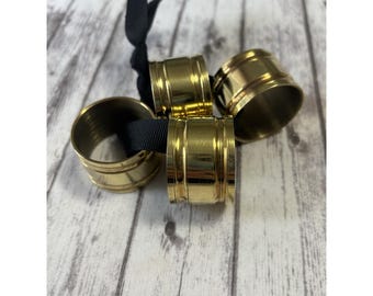 Uchwyty na serwetki BALDWIN 4 sztuki, mosiądz, wyprodukowane w USA, złoty i elegancki stół