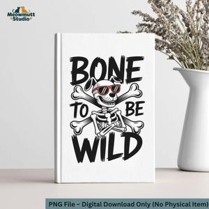 May include: A white notebook with the text "BONE TO BE WILD" in black, featuring a dog skeleton wearing sunglasses and crossed bones. The notebook is a digital download.