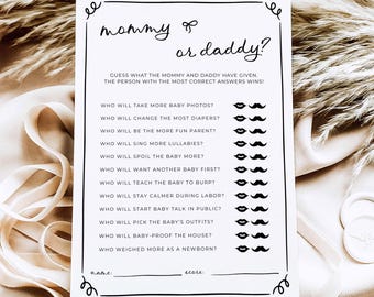 May include: A white rectangular game card with black text and a decorative border. The title reads Mommy or Daddy? followed by a list of questions. Each question is paired with a set of lip and mustache icons for marking answers, with name and score lines.