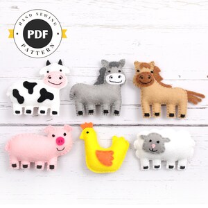 May include: A set of six felt farm animal patterns, including a cow, donkey, horse, pig, chicken, and sheep. The patterns are printed on white paper with the words "Hand Sewing PDF Pattern" in a circle.