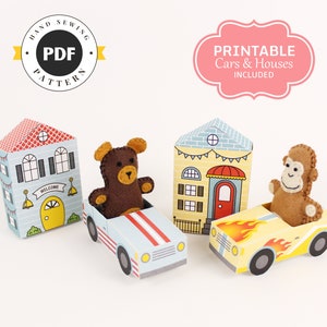 May include: Printable PDF pattern for felt toy cars and houses. The pattern includes a blue car with a brown bear inside, a yellow car with a monkey inside, and two houses with a red roof and a yellow roof.