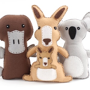 Felt plush stuffed animals from Australia: platypus, kangaroo with a joey in her pocket, and koala bear