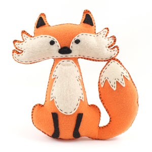 Hand sewn felt fox with embroidery embellishments