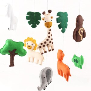 Jungle babies felt crib mobile including zebra, giraffe, lion, elephant, tiger, monkey, crocodile, leaves and tree