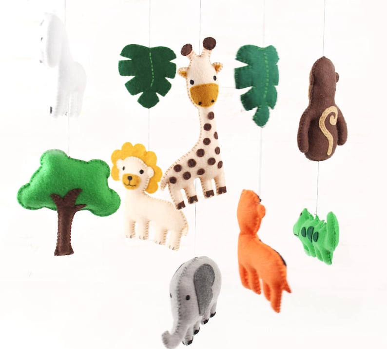 Jungle babies felt crib mobile including zebra, giraffe, lion, elephant, tiger, monkey, crocodile, leaves and tree