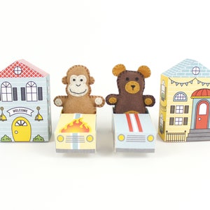 A tiny hand sewn felt monkey and bear, with printable paper cars and houses