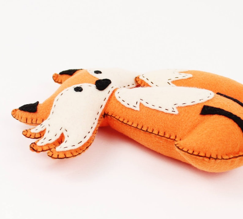 Felt plush fox lying down